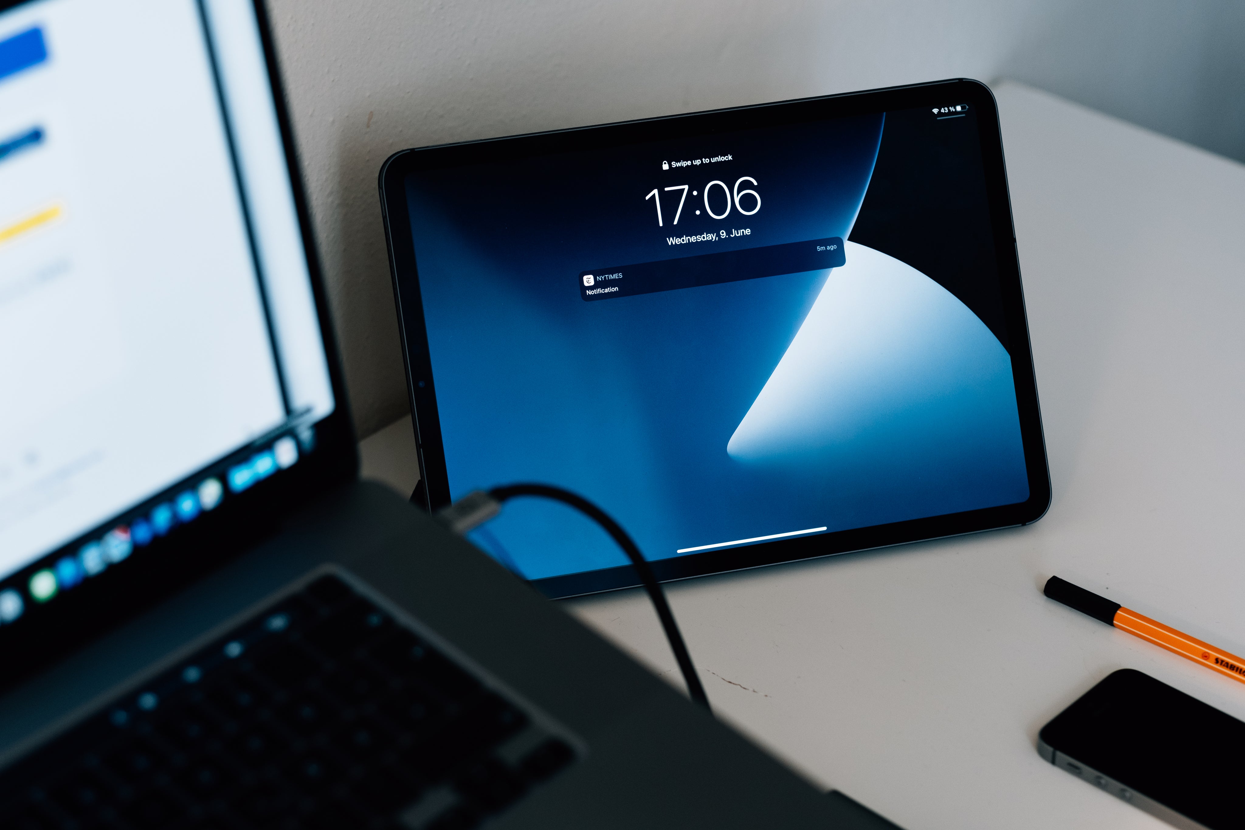 tablet-with-blue-screen-leans-against-a-wall.jpg