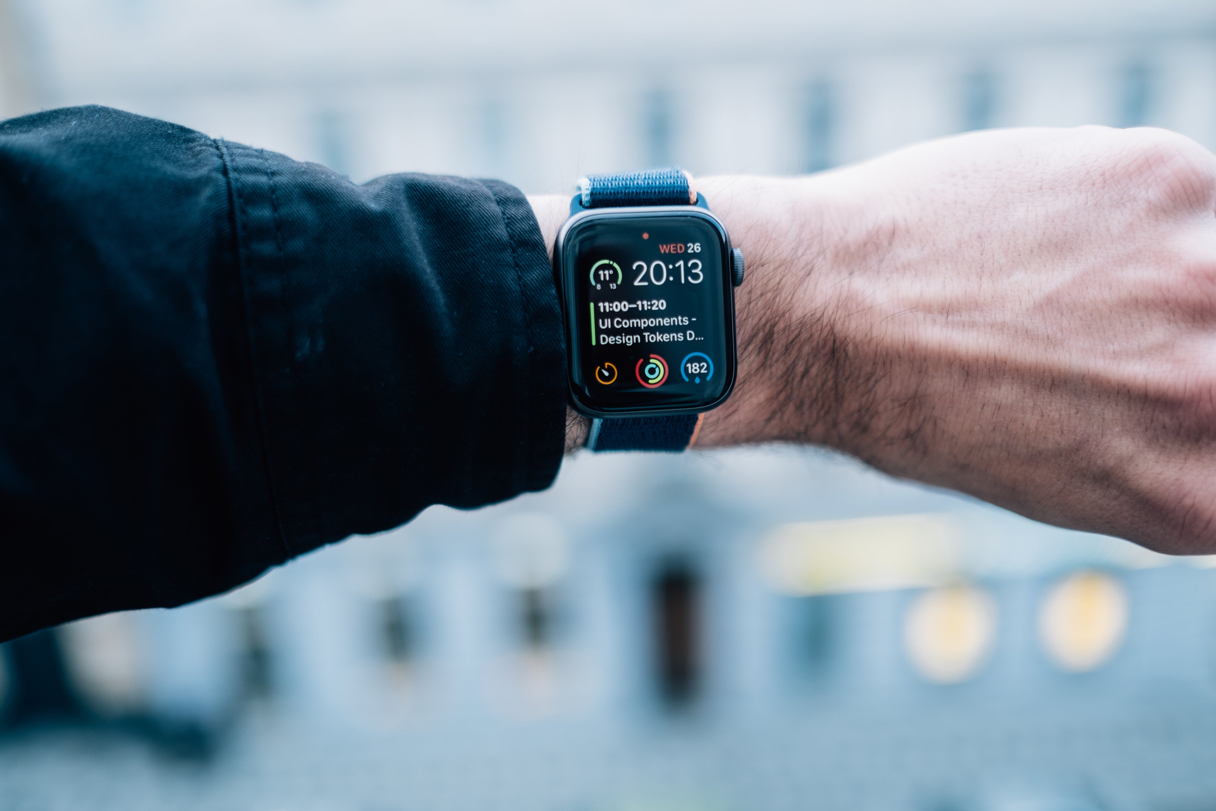 persons-wrist-wearing-a-smartwatch-which-shows-the-date.jpg
